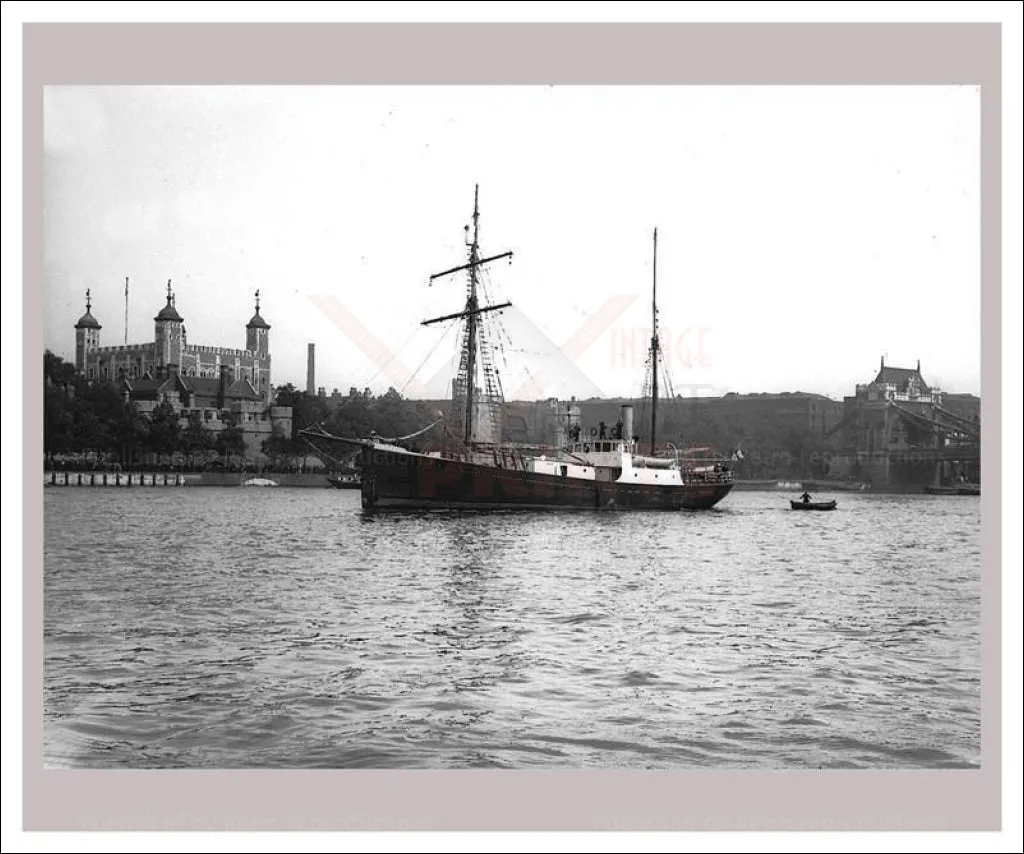 Boats sail past Battersea Power Station London