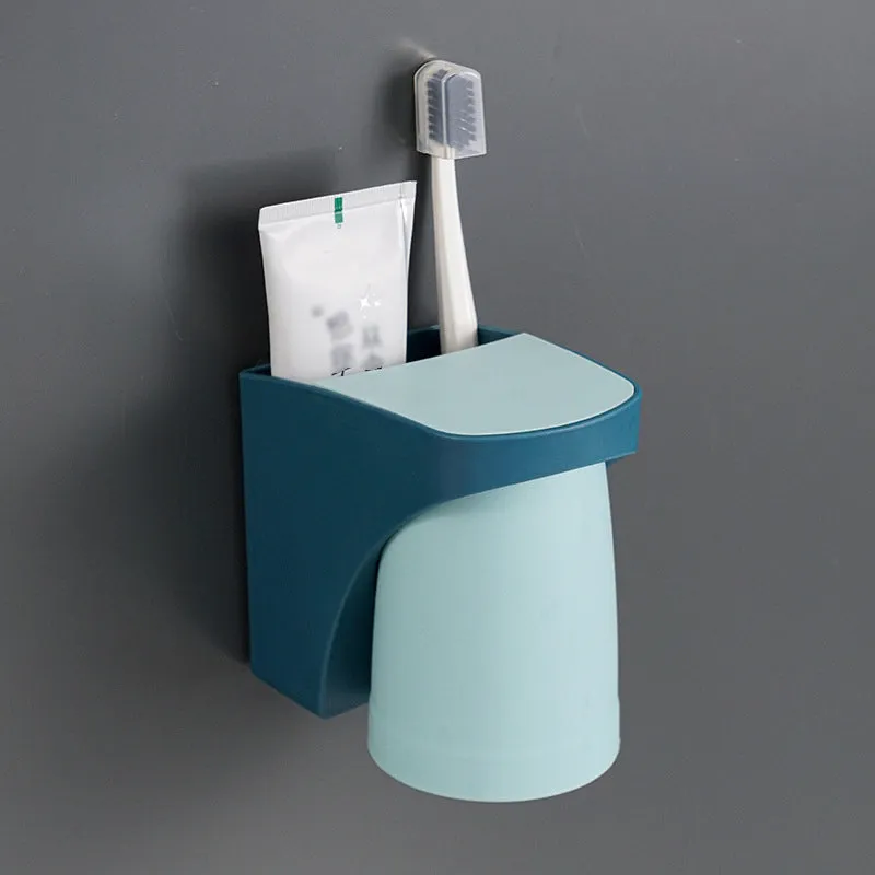 Magnetic mouthwash cup and toothbrush holder