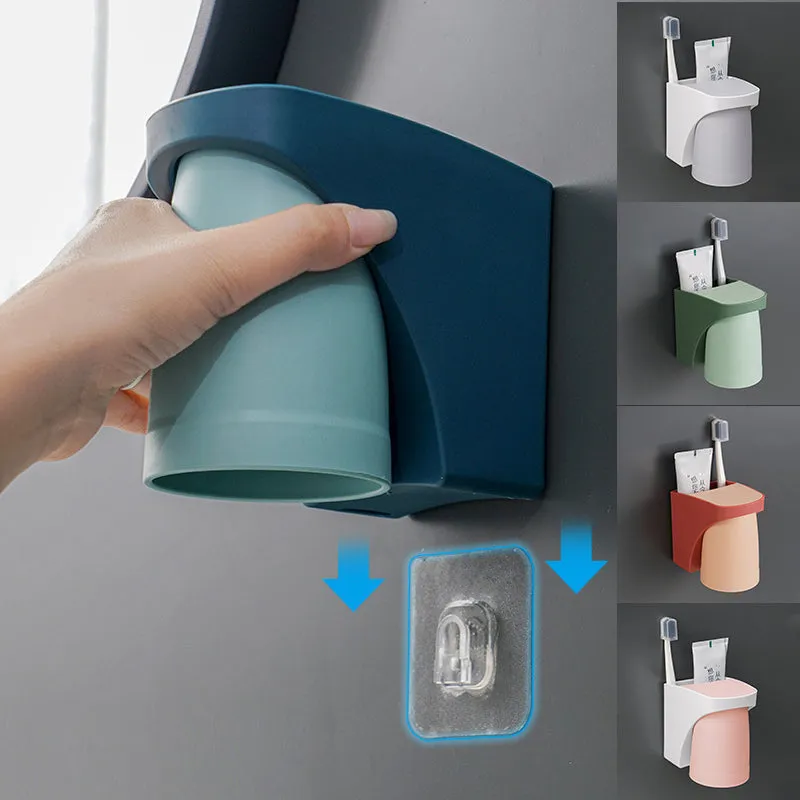 Magnetic mouthwash cup and toothbrush holder